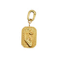 Złoty charms Dreamer Charm marki HOOKS ze stali nierdzewnej z motywem dłoni i księżyca oraz zapięciem typu hook.